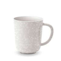 The Alchimie Dinnerware White mug by L'Objet features a speckled white ceramic finish and large handle, set against a plain background—a stylish, dishwasher-safe choice for your luxury tableware collection.