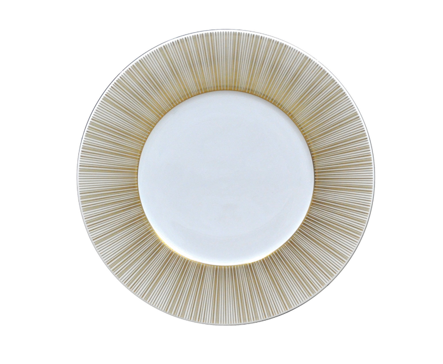 The Sol Dinnerware plate by Bernardaud is a round white Limoges porcelain plate with a decorative rim of thin gold radiating lines, shown from above on a white background.