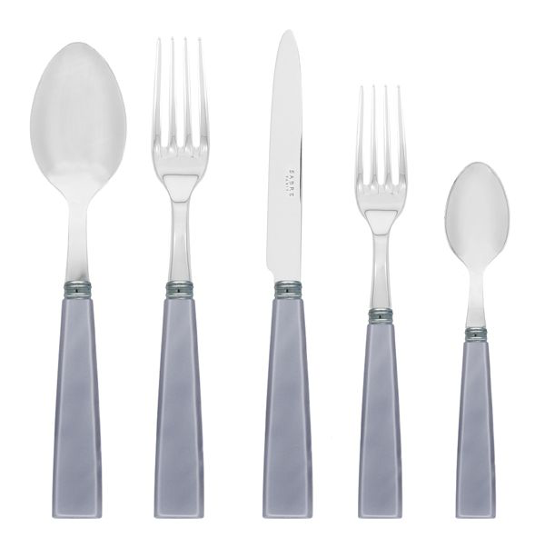 The Sabre Natura Flatware Light Grey 5 Piece Setting features a tablespoon, dinner fork, knife, salad fork, and teaspoon with shiny silver heads and square light grey acrylic handles, arranged upright on a white background.