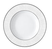 The Dune Dinnerware by Bernardaud is a white ceramic plate featuring a textured silver rim, inspired by handcrafted designs and the classic elegance of Limoges porcelain.