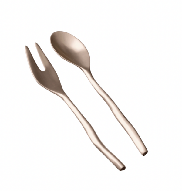The Sierra Maia Salad Servers by Beatriz Ball are a handmade matte gold set with a spoon and two-prong fork, featuring gently wavy handles for an eco-friendly, stylish addition to your table.