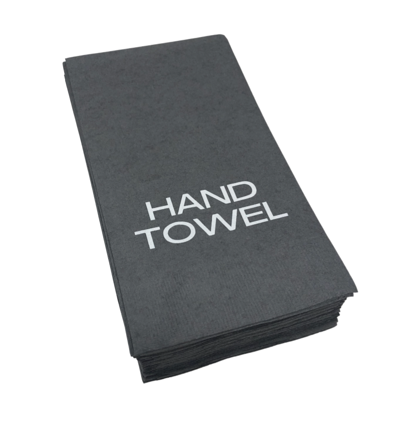 A stack of folded pewter guest hand towels by Print Appeal, each with "HAND TOWEL" in bold white letters—ideal for display in an acrylic guest towel holder.