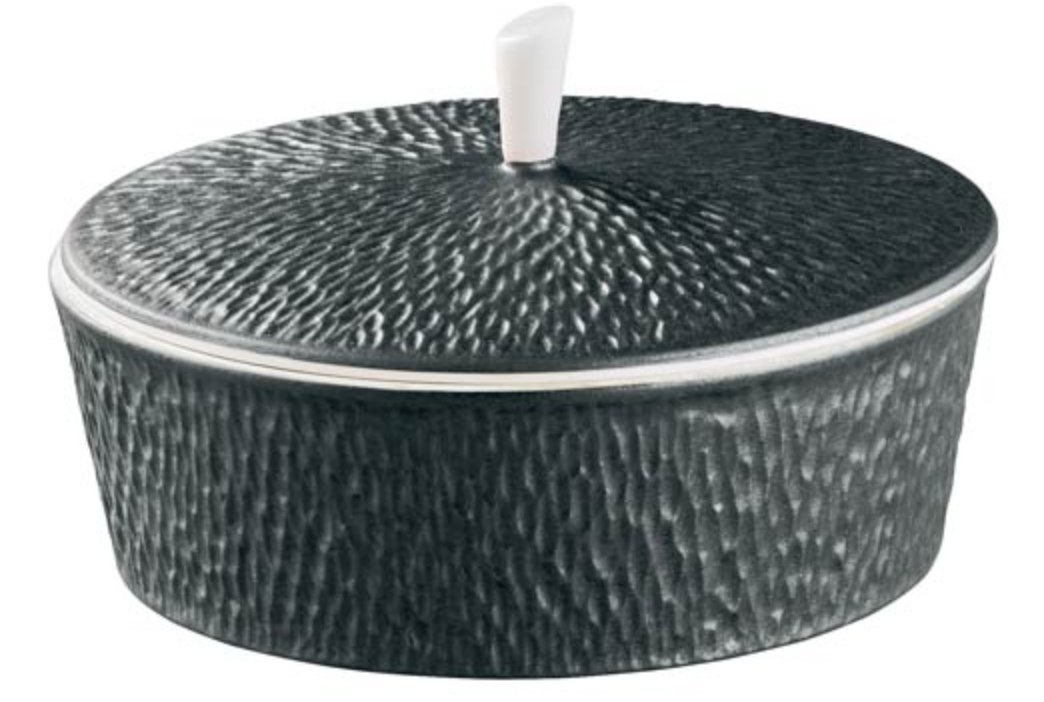 A textured, round dark gray ceramic container with a matching lid and white handle by Raynaud, ideal for pairing with Mineral Irise Dinnerware - Black or accenting modern table settings.