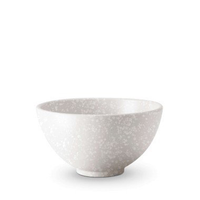 The Alchimie Dinnerware White bowl by L'Objet is a round, white ceramic piece with a speckled design, slightly flared rim, small base, and dishwasher-safe convenience. Shown against a plain white background.