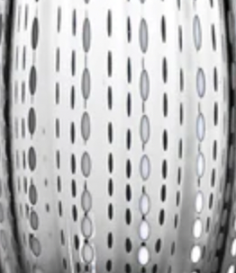 Close-up of a metallic surface with vertical rows of oval holes, reflecting light and dark areas—evoking the refined craftsmanship seen in Zafferano’s Perle Wine Goblet Set of 2.