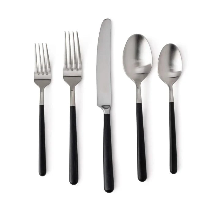 The Simon Pearce Hampton Flatware 5 Piece Setting features stainless steel and black resin handles—includes two forks, a knife, a tablespoon, and a teaspoon—shown side by side on a white background.