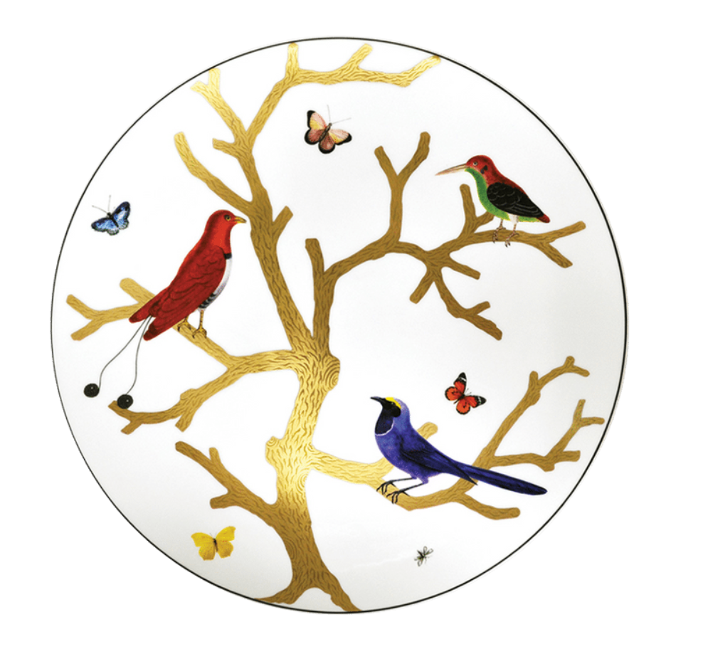 The Aux Oiseaux Dinnerware by Bernardaud is a Limoges porcelain plate featuring a gold tree with three colorful birds, butterflies, and a black ant on a white background.