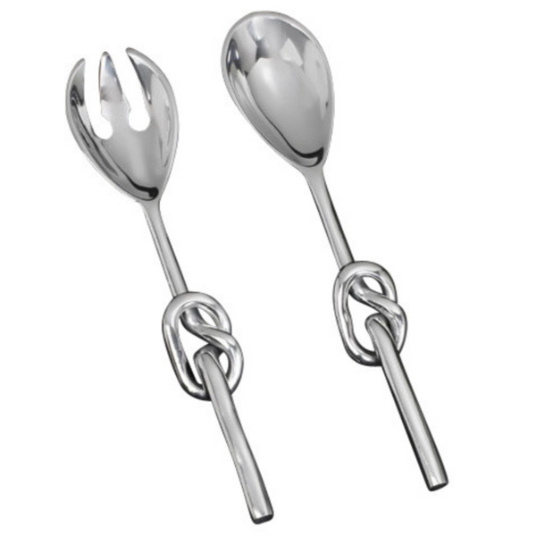 The Knotty Salad Set by Inspired Generations features a handcrafted aluminum fork and spoon with striking decorative knot handles—an elegant, shiny silver duo perfect for stylish salad serving.
