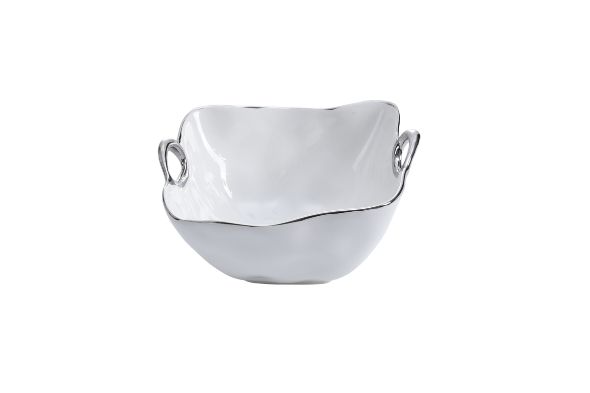 The PAMPA BAY Handle Bowl Silver Trim is a high-fired white porcelain bowl with a wavy rim and two silver handles, shown against a plain white background.