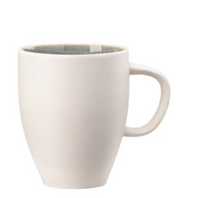 The Rosenthal Junto Aquamarine Dinnerware mug features a rounded stoneware body, large handle, and a subtly patterned interior. Dishwasher and microwave safe, it's shown against a white background.