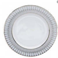 The Arcades Platinum Dinnerware by Philippe Deshoulieres BIA is a white Limoges porcelain plate with a refined silver and gray patterned rim, featuring an intricate edge design for an elegant touch.