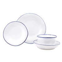The Vietri Aurora Edge Dinnerware set features white stoneware with a thin blue rim, including two plates, a bowl, and a small dish—each chip-resistant and shown neatly arranged against a white background.