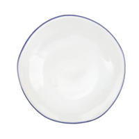 The Aurora Edge Dinnerware by Vietri is a round, white ceramic plate with a thin light blue rim and slightly irregular shape, handmade in Italy and shown from above on a white background.