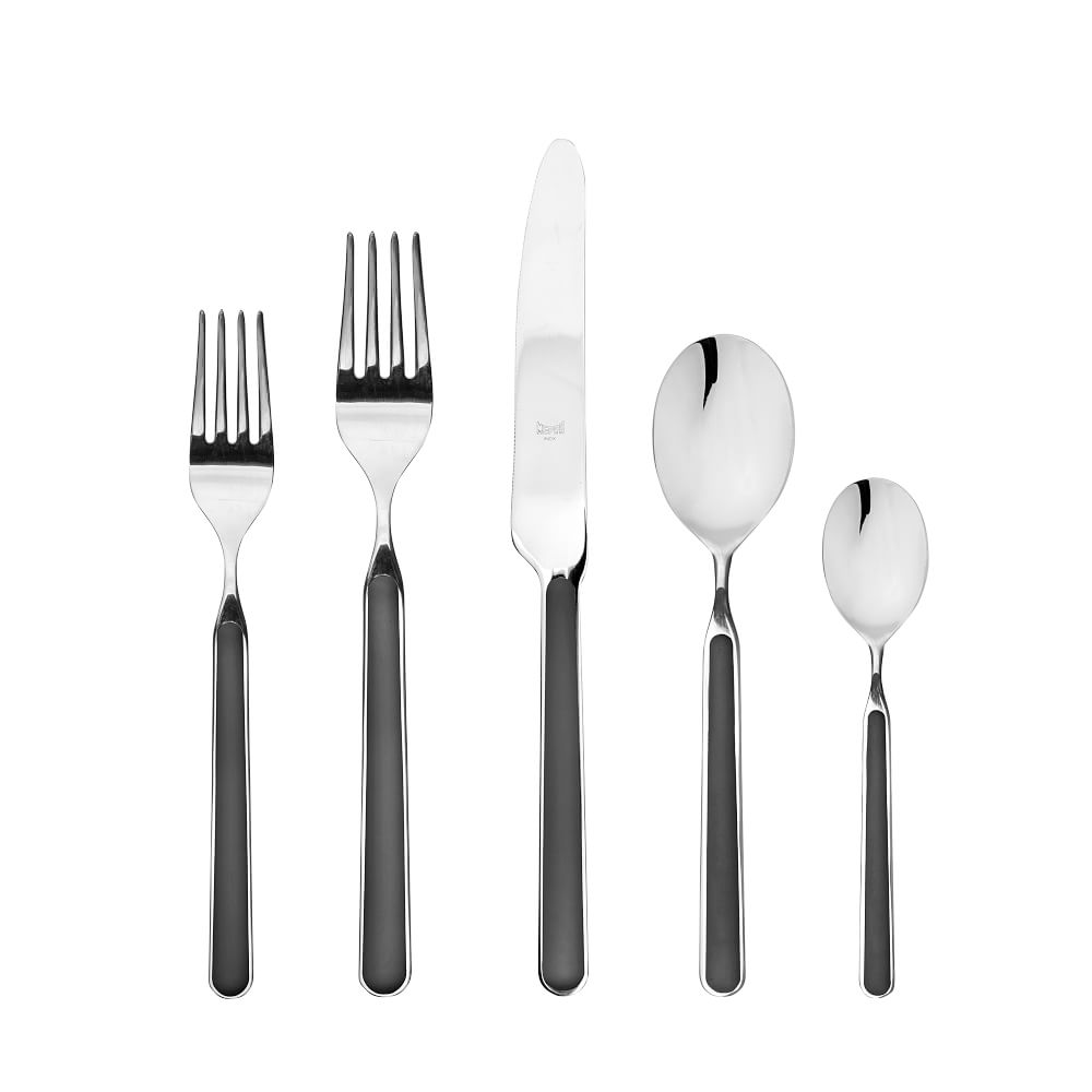 The Mepra Fantasia Flatware 5 Piece Set comes in 16 colors with black resin handles, includes a dinner fork, salad fork, knife, soup spoon, and teaspoon—all dishwasher safe and displayed side by side on a white background.