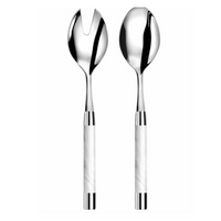 The Capdeco Conty Salad Serving Set White includes two shiny utensils with silver 18/10 stainless steel tops and white handles: a single-slot salad fork on the left and a solid serving spoon with metallic accents on the right.