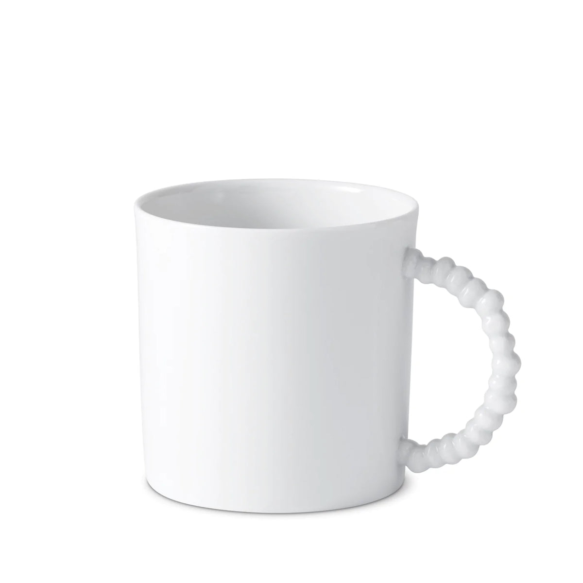 The L’Objet Haas Mojave White Dinnerware mug is made of fine porcelain and features a distinctive, textured beaded handle inspired by the playful artistry of the Haas Brothers.