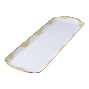 The Marie Daâge Iris 2 Dinnerware features a rectangular white porcelain serving tray with gently curved edges and an elegant gold rim, highlighting the brand's signature style. The empty tray is displayed against a plain white background.