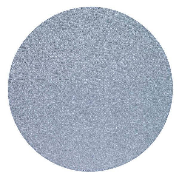 The Bodrum Skate Round Placemat Ice Blue set of 4 features large, circular 16" placemats in a light blue shade, made from phthalate-free vinyl for easy care, displayed on a white background.