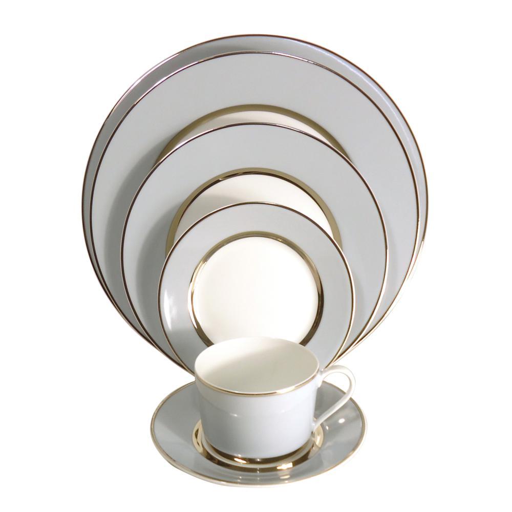The Recamier MAK Grey & Platinum Dinnerware by Royal Limoges/Bia Cordon Bleu features five plates in assorted sizes plus a teacup with saucer—an elegant, modern set to enhance any dining collection.