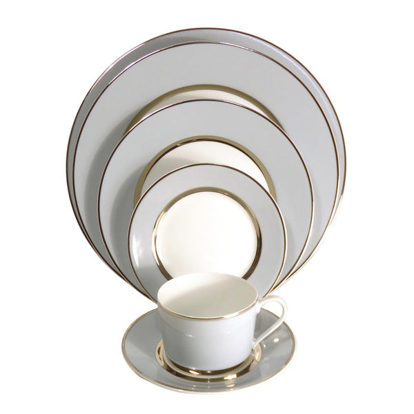 The Recamier MAK Grey & Platinum Dinnerware by Royal Limoges/Bia Cordon Bleu features five plates in assorted sizes plus a teacup with saucer—an elegant, modern set to enhance any dining collection.