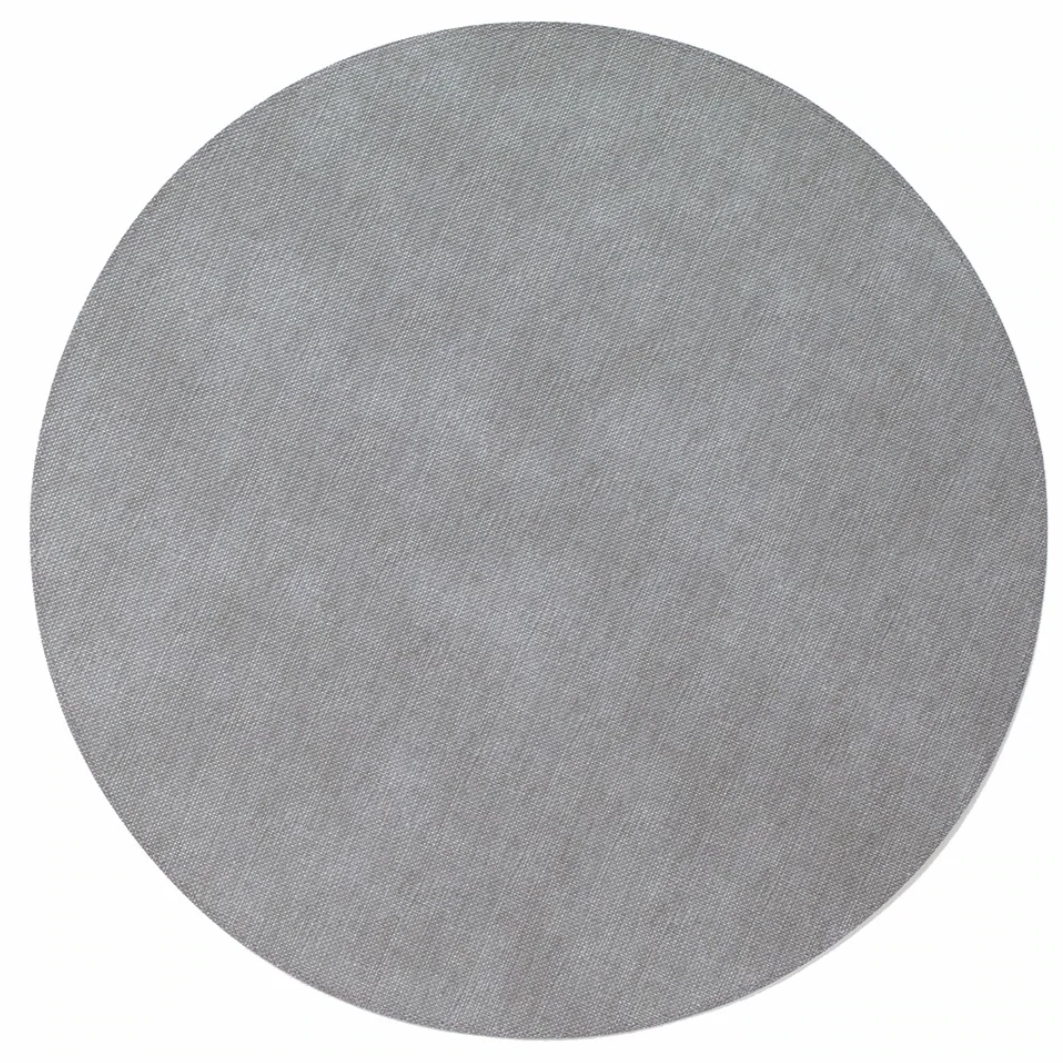 The Bodrum Pronto Placemat Round Set of 4 features gray, round, flat placemats with a soft, fabric-like texture. Made from phthalate-free vinyl for easy cleaning. Shown against a white background.