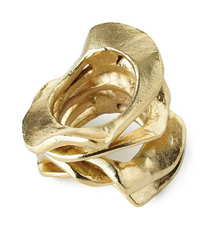 The Flux Napkin Ring Gold Set of 4 by Kim Seybert features sculptural, organic brass-plated aluminum rings with a textured finish and curved overlapping layers, making an elegant accent for your table decor.