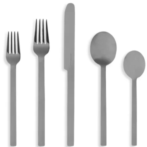The Mepra Stile Oro Nero 5 Piece Setting features five matte gray utensils—salad fork, dinner fork, knife, tablespoon, and teaspoon—arranged side by side.
