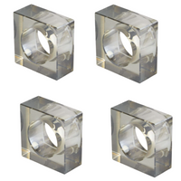 The Tizo Crystal Cube Napkin Ring Smoke Set of 4 features transparent, square crystal napkin rings with circular centers, arranged in a grid on a white background.