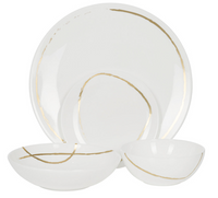 The Sketch Chalk Dinnerware by Royal Crown Derby features three white fine bone china bowls and plates with simple, irregular gold lines, elegantly arranged on a white background.