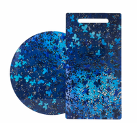 Two blue pieces from Eye Candy: the Blue Butterflies Lazy Susan and a rectangular acrylic serving board with butterfly and clover shapes—ideal additions to your Blue Butterfly serving pieces collection.