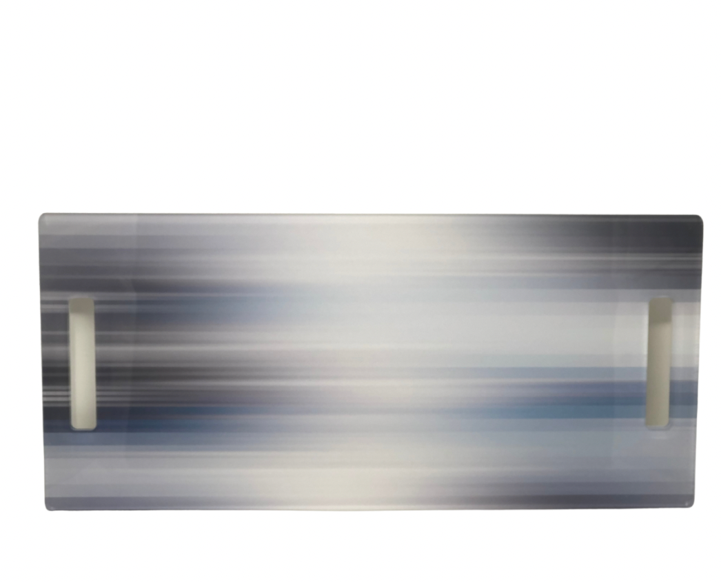 The Eye Candy Serving Long Board | Blurred Lines features two handles and a modern blue and gray gradient stripe on white—ideal for serving or displaying treats on your kitchen island.