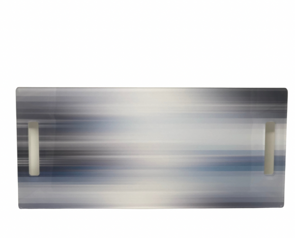 The Eye Candy Serving Long Board | Blurred Lines features two handles and a modern blue and gray gradient stripe on white—ideal for serving or displaying treats on your kitchen island.