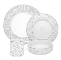 The Vista Alegre Trasso Dinnerware set includes four white porcelain pieces with geometric gray and platinum accents: dinner plate, salad plate, mug, and bowl—each elegantly coordinated in design.