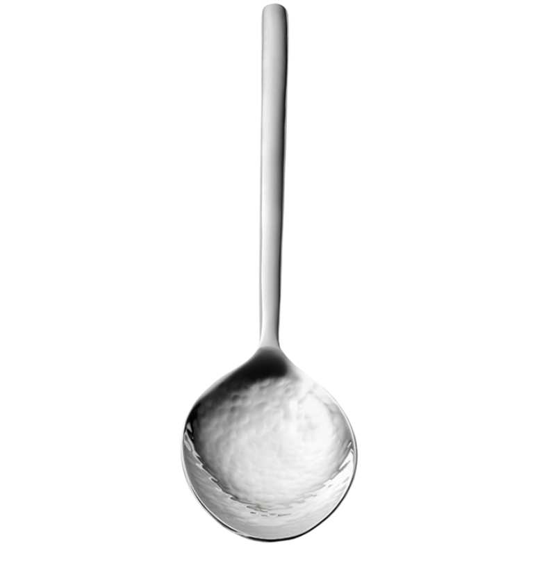 The Mary Jurek Versa Vegetable Spoon, featuring a long handle and round, deep bowl, is expertly handcrafted—ideal for serving vegetables and shown from above on a white background.