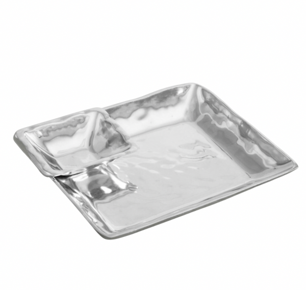 The Beatriz Ball Linda Chip & Dip Set is a shiny, square metallic tray with a smaller corner compartment, oven and freezer safe, shown on a white background.
