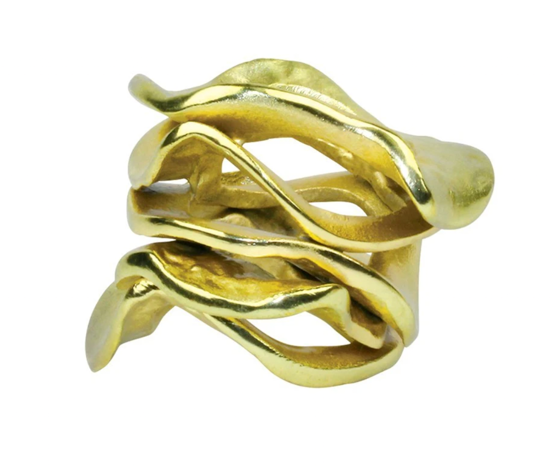 The Flux Napkin Ring Gold Set of 4 by Kim Seybert features a sculptural design with three wavy, overlapping bands and a polished finish, adding abstract elegance and artistic flair to your table decor.