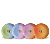 The L’Objet Lito Canape Plate Set of 4 features round porcelain plates with gradient backgrounds in green, blue, purple, and orange, each adorned with a stylized eye at the center and subtle 24K gold plating accents.