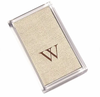 The Caspari Acrylic Guest Towel Holder displays a rectangular beige fabric card with a subtle herringbone pattern and bold brown "W," adding a modern touch.