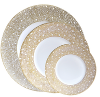 Three round plates from Bernardaud's Ecume Dinnerware Mordore collection display white centers with gold dotted rims, arranged slightly overlapping on a white background.