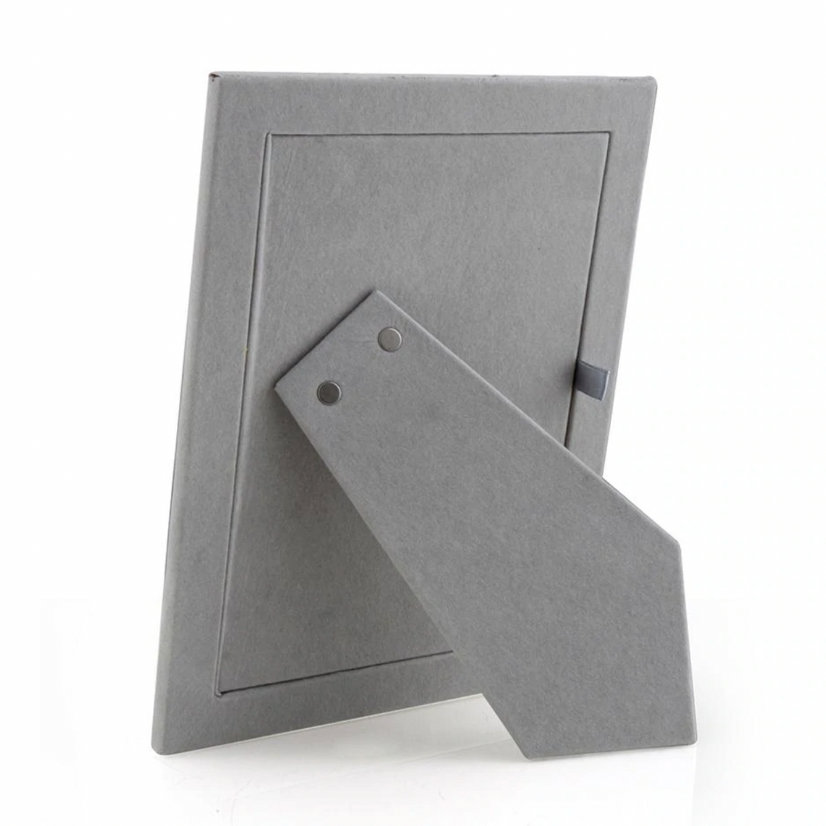The Enamel Thin Frame - Denim by Addison Ross is displayed from the back with a two-way easel stand for upright placement, empty and set against a white background. Silver trim accents highlight its stylish gray design.