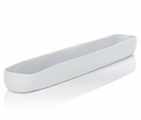 The Tina Frey Resin Trough White Long is an elegant, oval-shaped tray with smooth, slightly irregular edges, ideal as a serving piece or table decor, shown on a white surface.