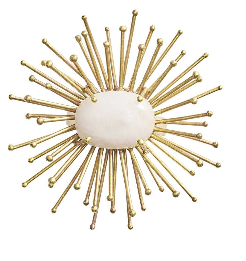 Inspired by the Kim Seybert Flare Napkin Ring Gold Set of 4, this wall ornament features a white oval center and radiating gold rods, adding starburst style and handmade elegance to your decor.