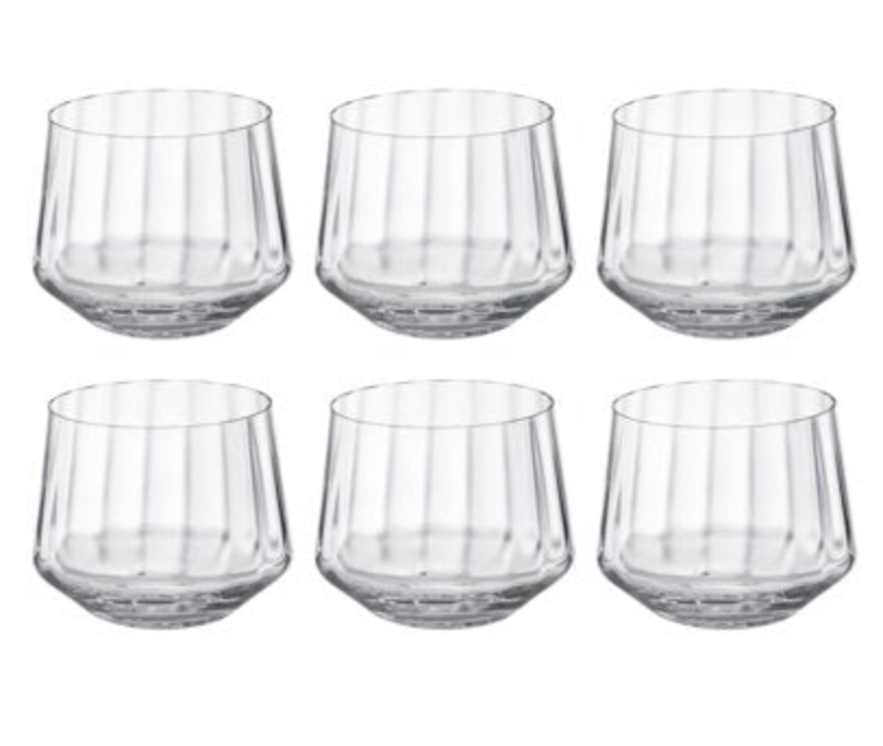 The Bernadotte Glassware Set of 6 by Georg Jensen showcases clear, short tumbler glasses with faceted sides in Scandinavian design, arranged in two rows of three against a white background for a timeless look.