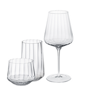 The Georg Jensen Bernadotte Glassware Set of 6 features clear, ribbed glasses in Scandinavian design—including short, tall, and stemmed styles—all elegantly displayed against a white background.