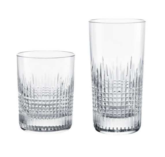 The Baccarat Nancy Barware Set of 2 features two clear, patterned crystal tumblers—a short, wide glass and a taller, slimmer one—displayed side by side on a white background.