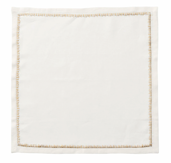 The Kim Seybert Filament Napkin Gold & Silver Set of 4 features white linen napkins with elegant gold stitched borders—ideal for festive table settings.