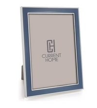 The Addison Ross Enamel Thin Frame in Denim with silver trim and a two-way easel stand is shown at a slight angle on a white background, displaying an insert at the center.