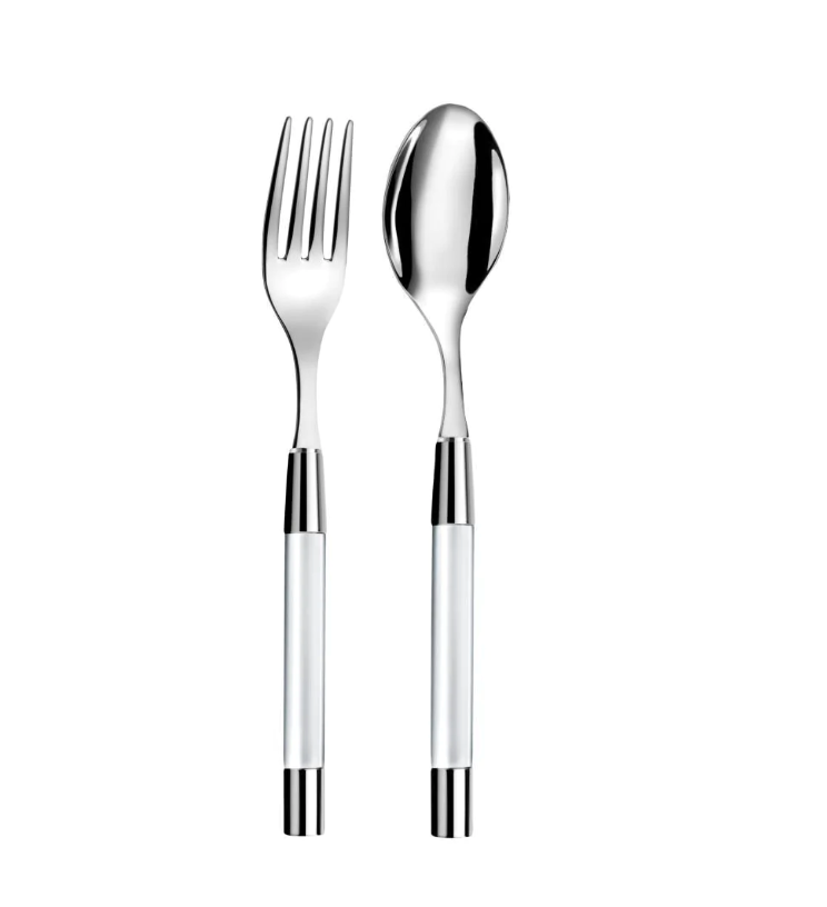 The Capdeco Zoe Salad Serving Set features a stainless steel fork and spoon with reflective finishes and modern handles. Placed side by side on a white background, both dishwasher safe for elegant serving.