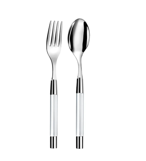 The Capdeco Zoe Salad Serving Set features a stainless steel fork and spoon with reflective finishes and modern handles. Placed side by side on a white background, both dishwasher safe for elegant serving.