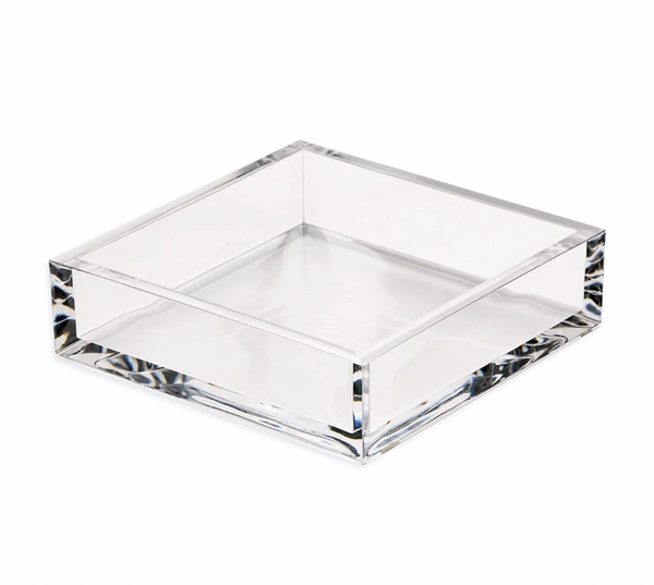 The Caspari Acrylic Cocktail Napkin Holder features a clear, square design with straight sides and a flat bottom—perfect for displaying cocktail napkins or gifting as an elegant hostess accessory.